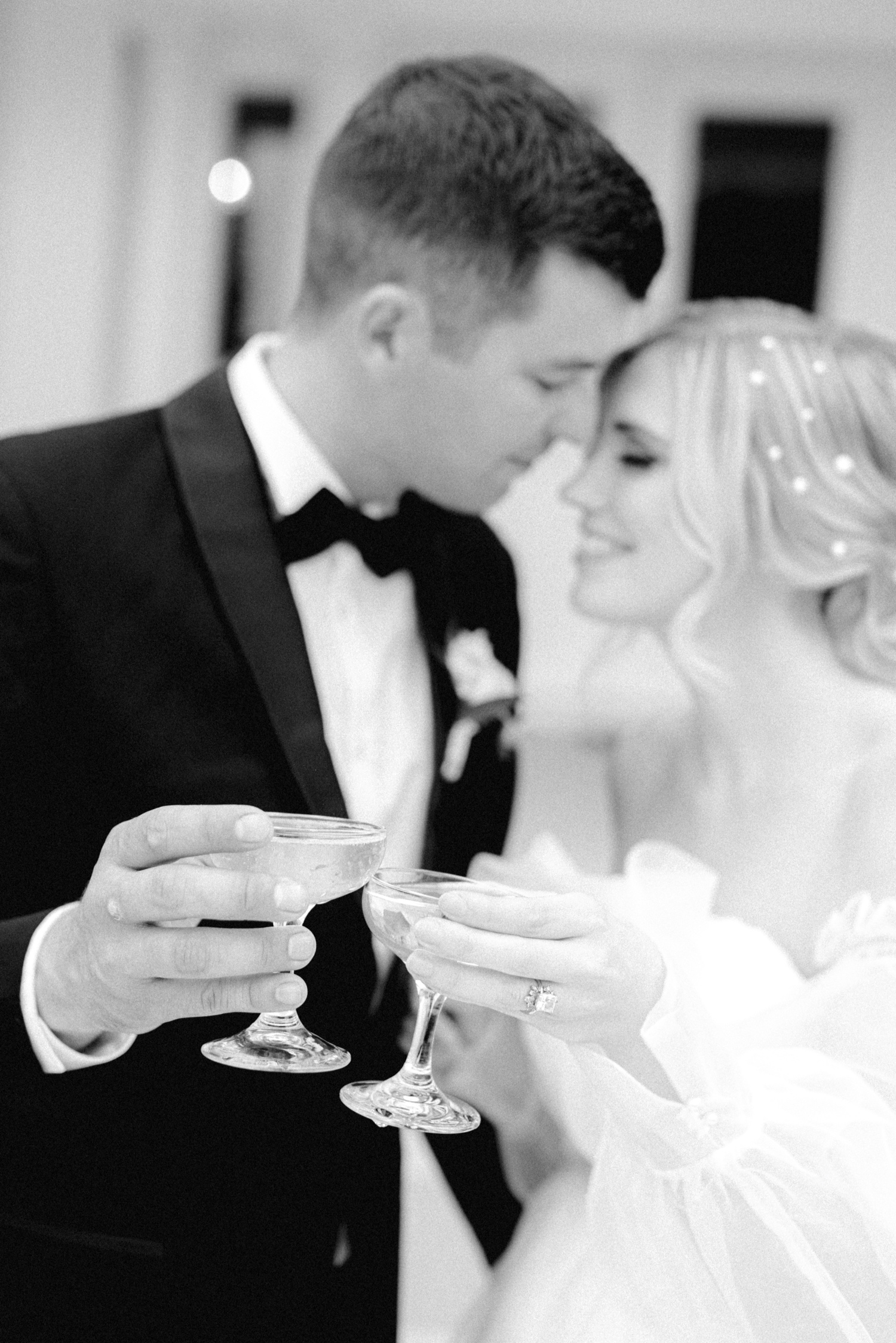 Bride and groom champagne cheers for Moore Mansion Wedding