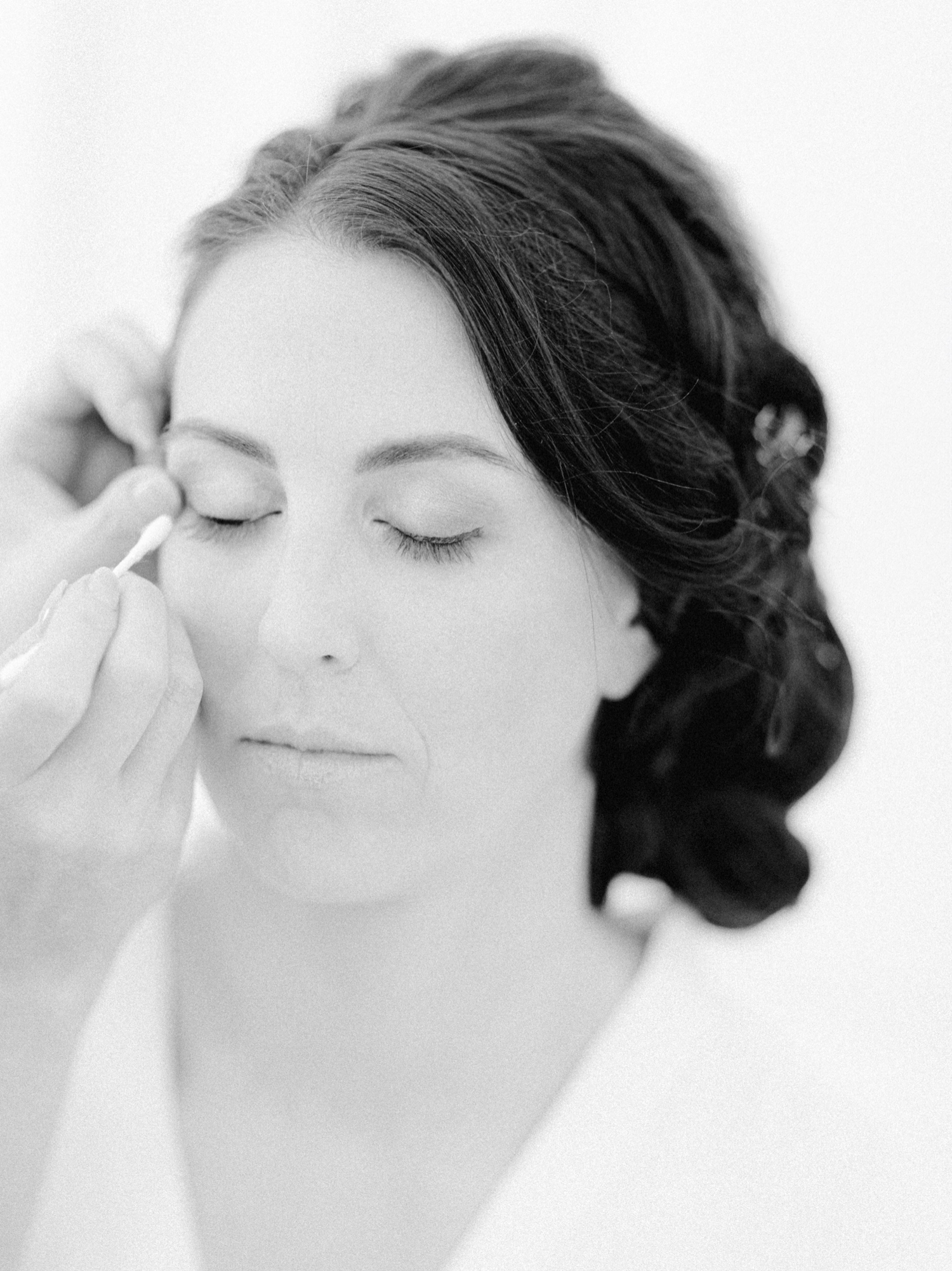 bride getting makeup done for harmony meadows wedding