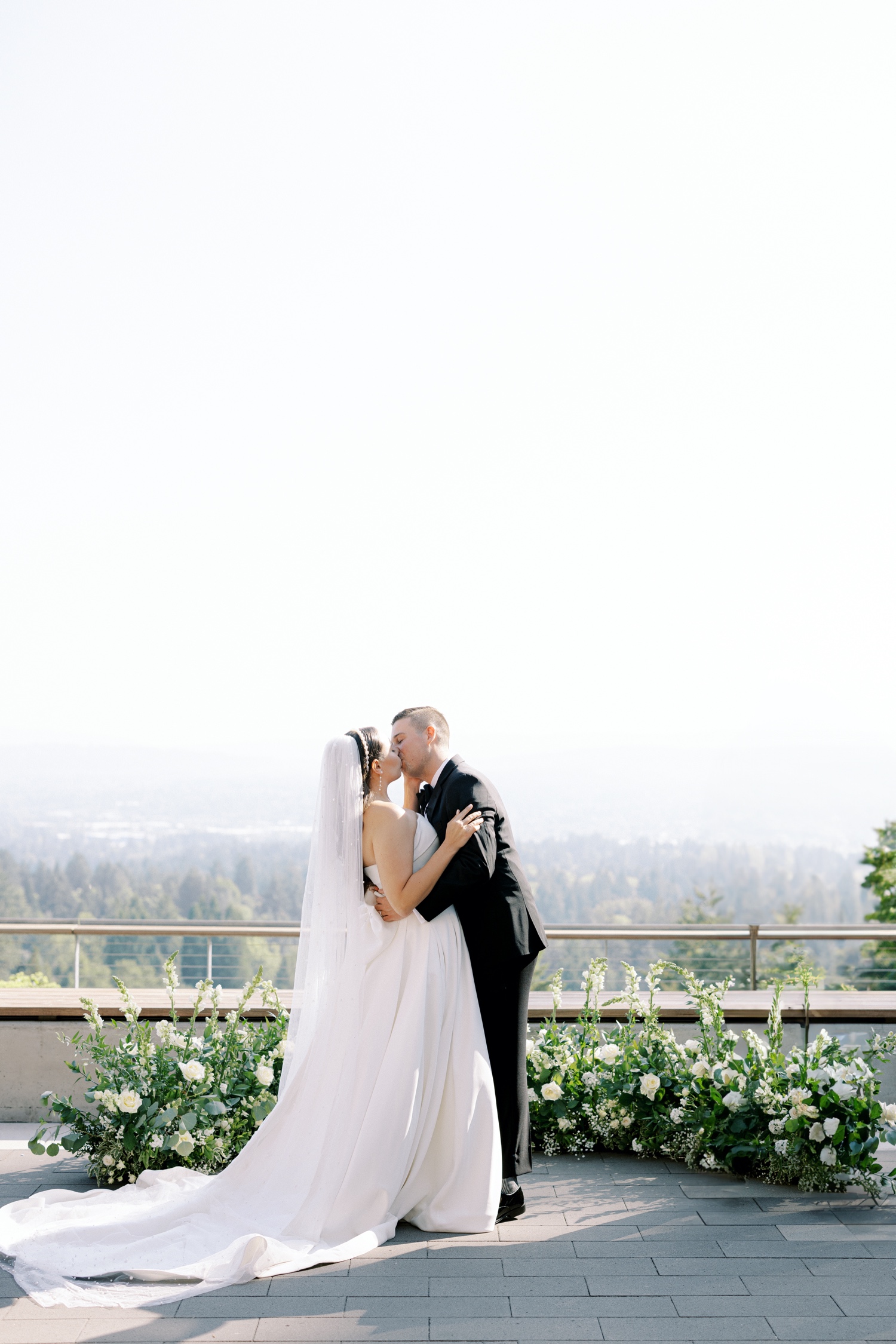 Bride and groom share first kiss at Amaterra Winery wedding