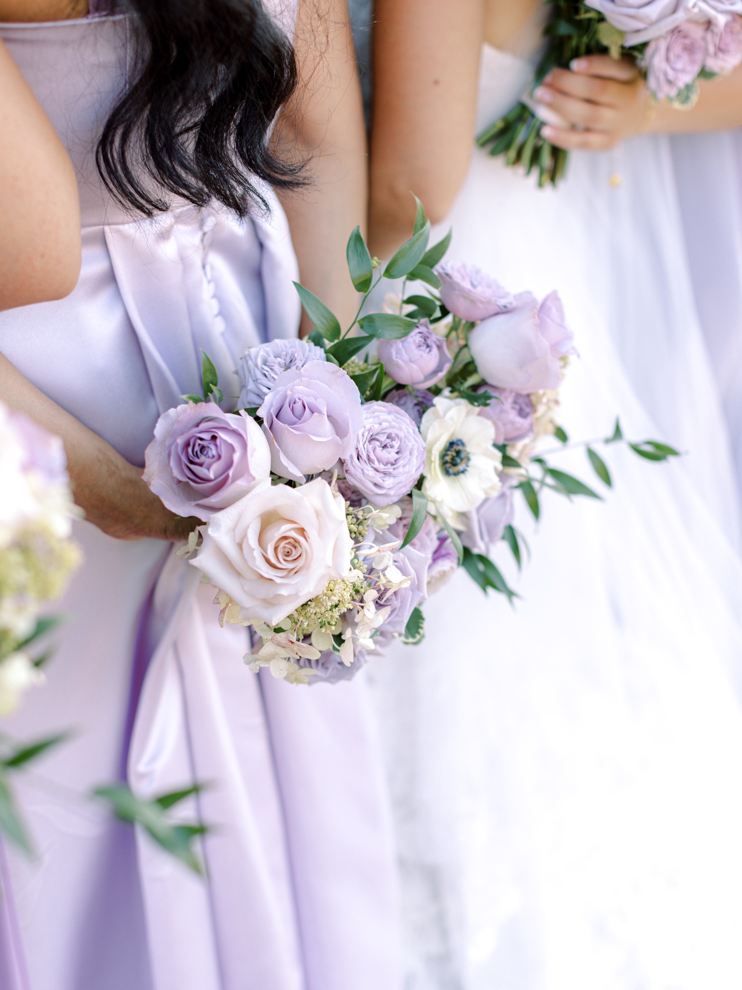 bride and bridesmaids bouquets by anthesis floral co at hayden lake country club wedding