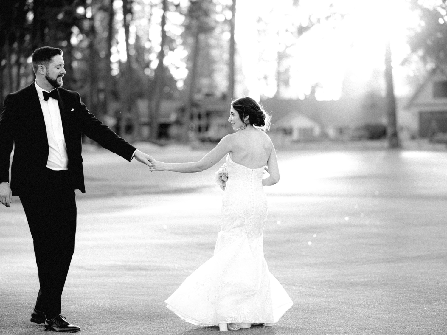 bride and groom dancing on the golf course at hayden lake country club wedding