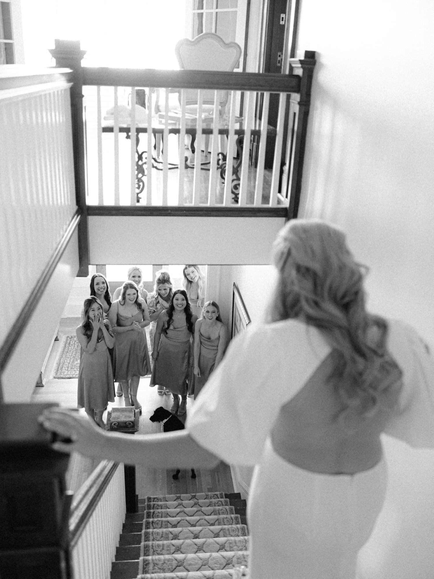 bride revealing her wedding dress to bridesmaids for southern wedding at abeja winery