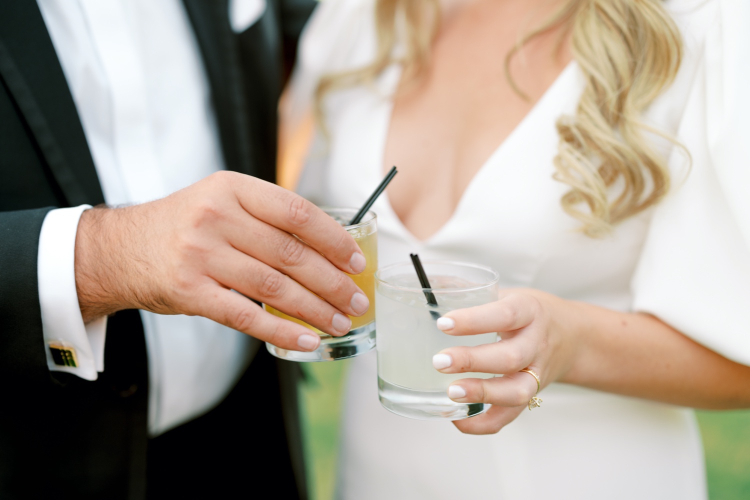 bride and groom cheers their signature drinks for their southern wedding at abeja winery