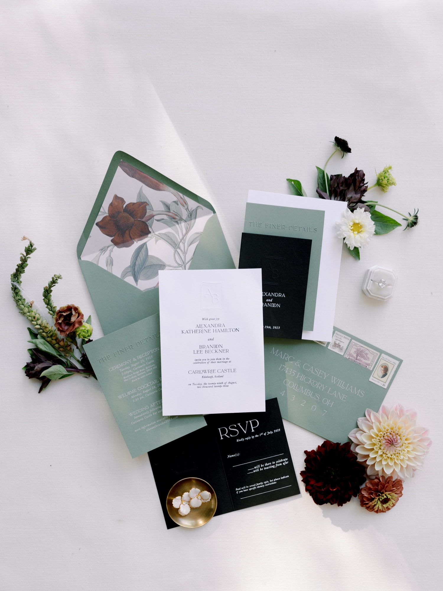 full wedding invitation flat lay designed by papier and design for oakshire airfield and estate wedding
